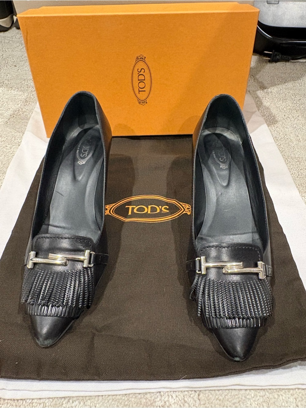 TOD'S Black Leather Pointed Toe Kiltie Heels with Metal Bit